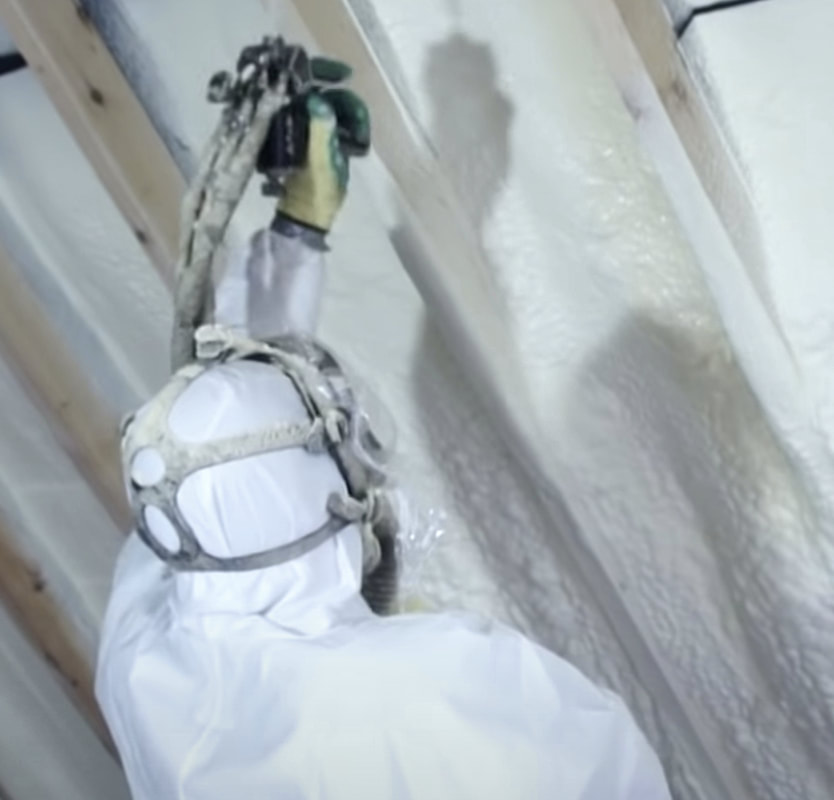 contractor using spray foam in Chicago attic